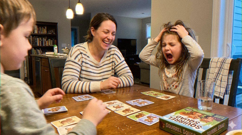 Family around the kitchen table mid-NOOOO